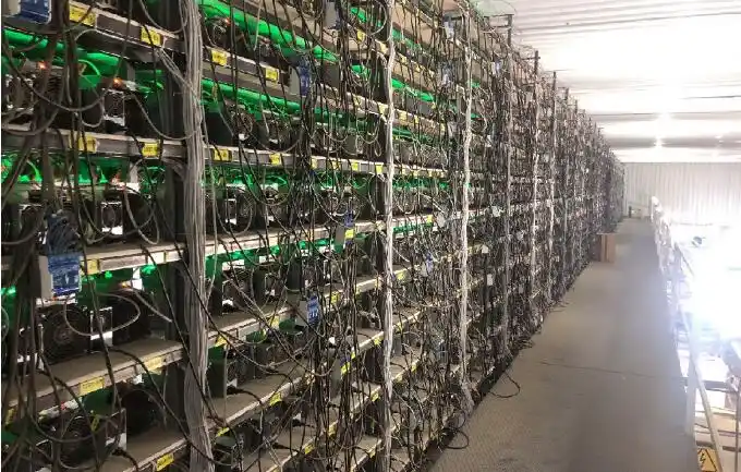 Close-up of a high-efficiency Ethereum miner in a professional hosting environment