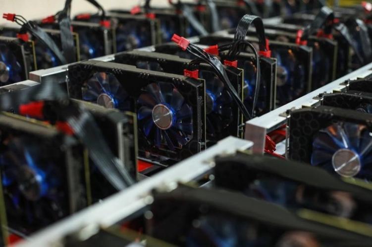 Rows of ASIC bitcoin mining rigs with integrated solar-powered energy management systems